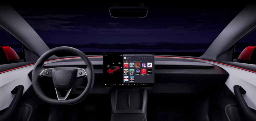 The interior of a Tesla Model X showcasing design tweaks at night.
