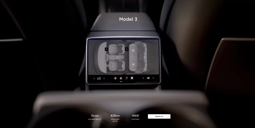 The redesigned dashboard of a Tesla Model 3 with an integrated screen.