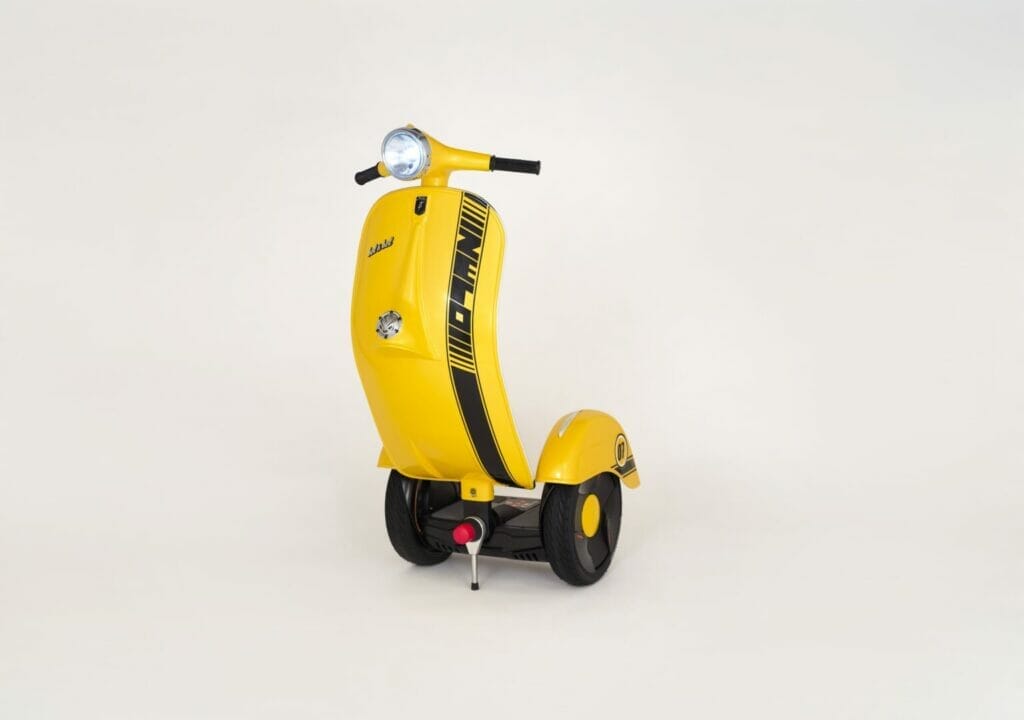 A yellow scooter on a white background.