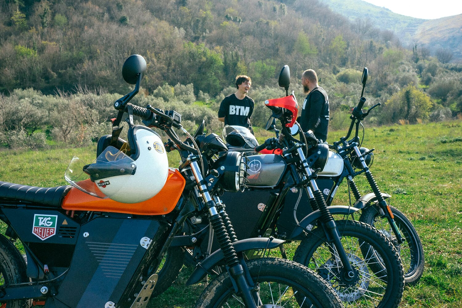 a motorcycle parked on the side of a mountain