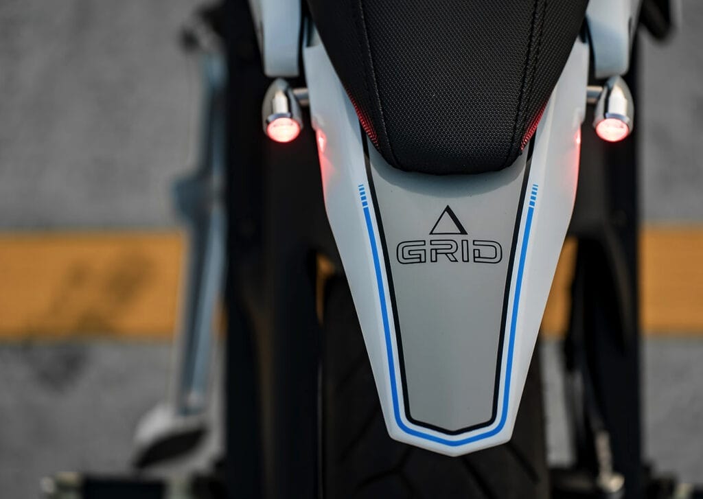 A close up of the tail light of a motorcycle.