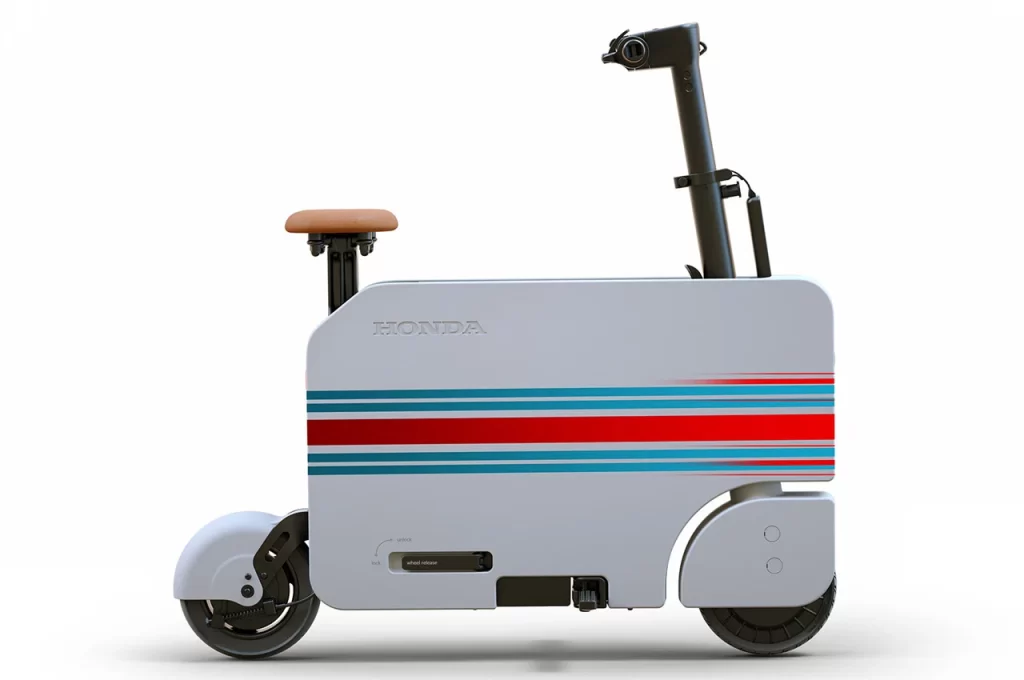 A white scooter with a red, blue and white stripe.