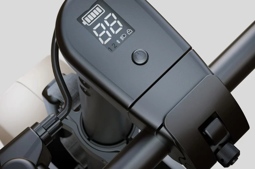 A close up of the handlebar of a Kawasaki electric scooter.