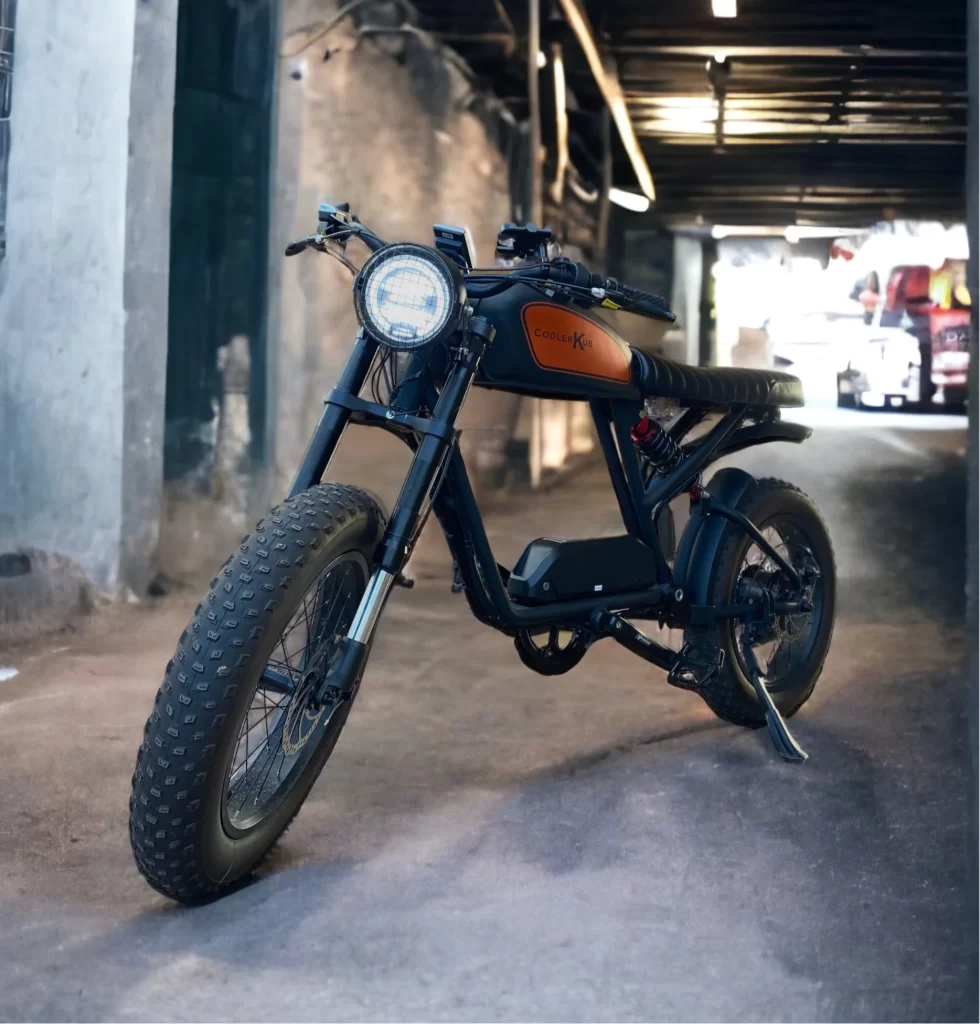 A motorcycle parked in an alleyway.