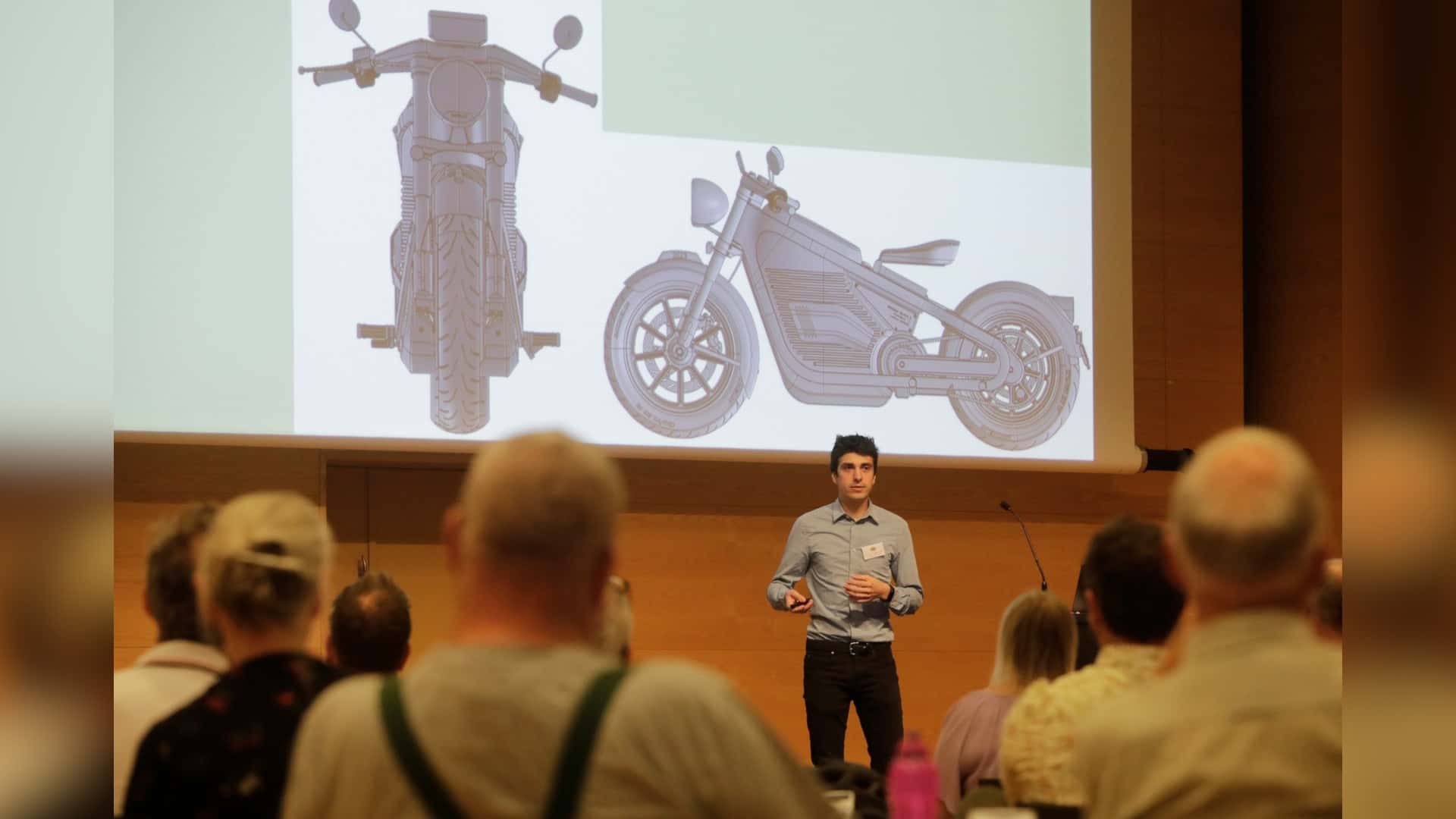 a group of people standing in front of a mirror posing for the camera