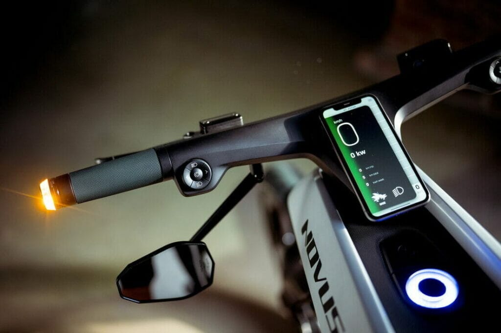 A close up of the handlebar of a premium electric motorcycle.