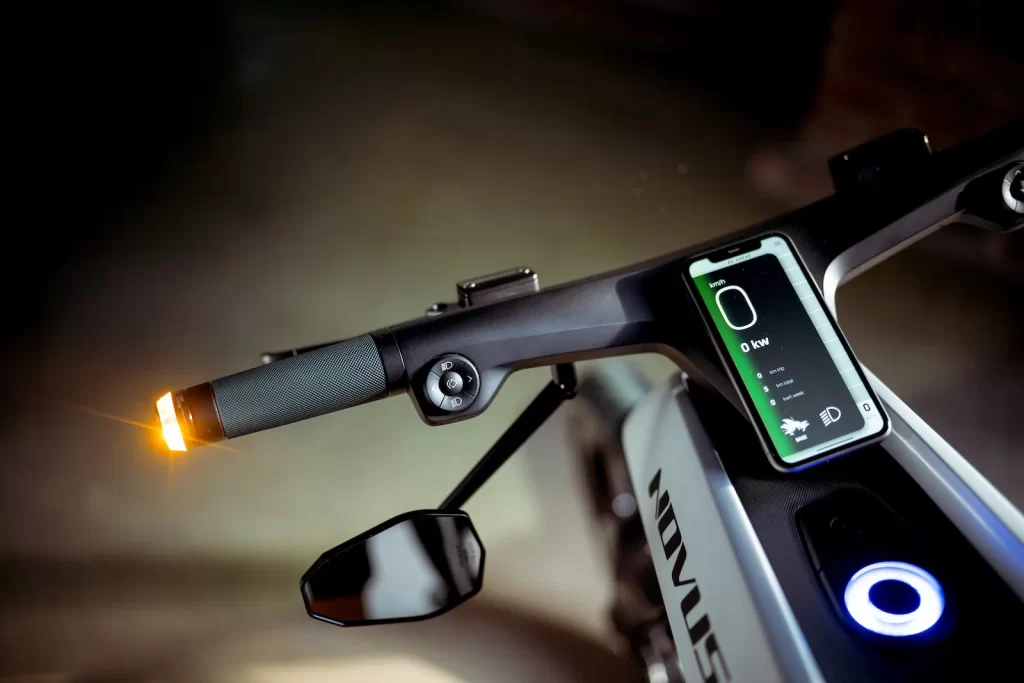 A close up of the handlebar of an electric bike.