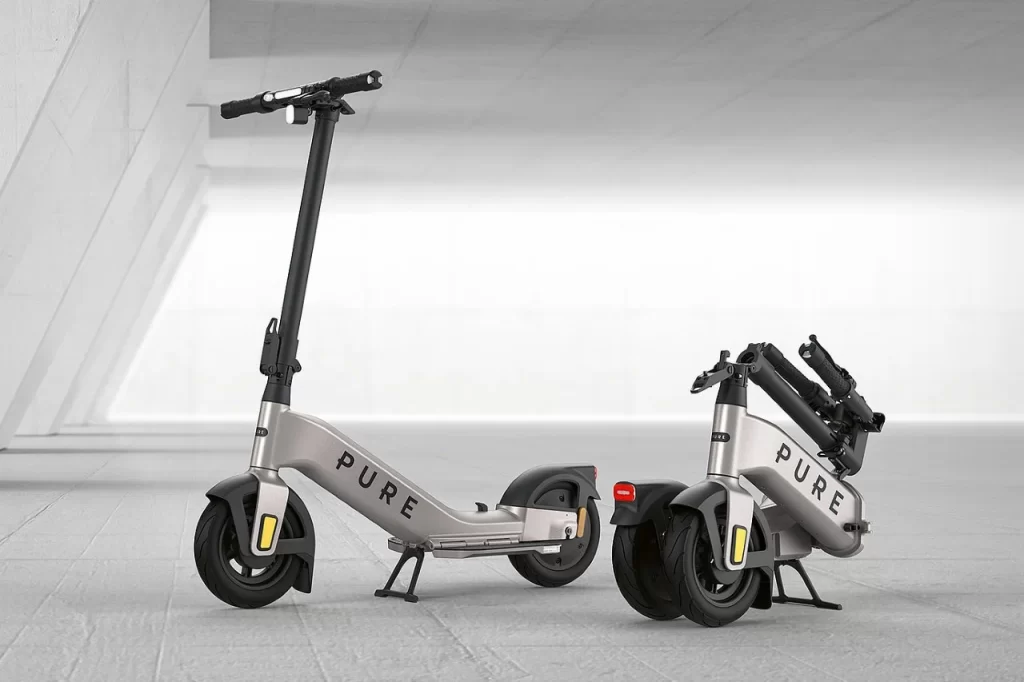 Two electric scooters are shown next to each other.