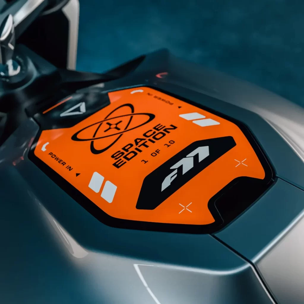close up, motorcycle, orange sticker.