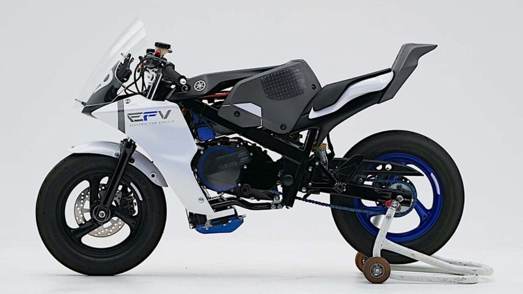 A white and blue motorcycle showcased at Yamaha's 2023 Japan Mobility Show.