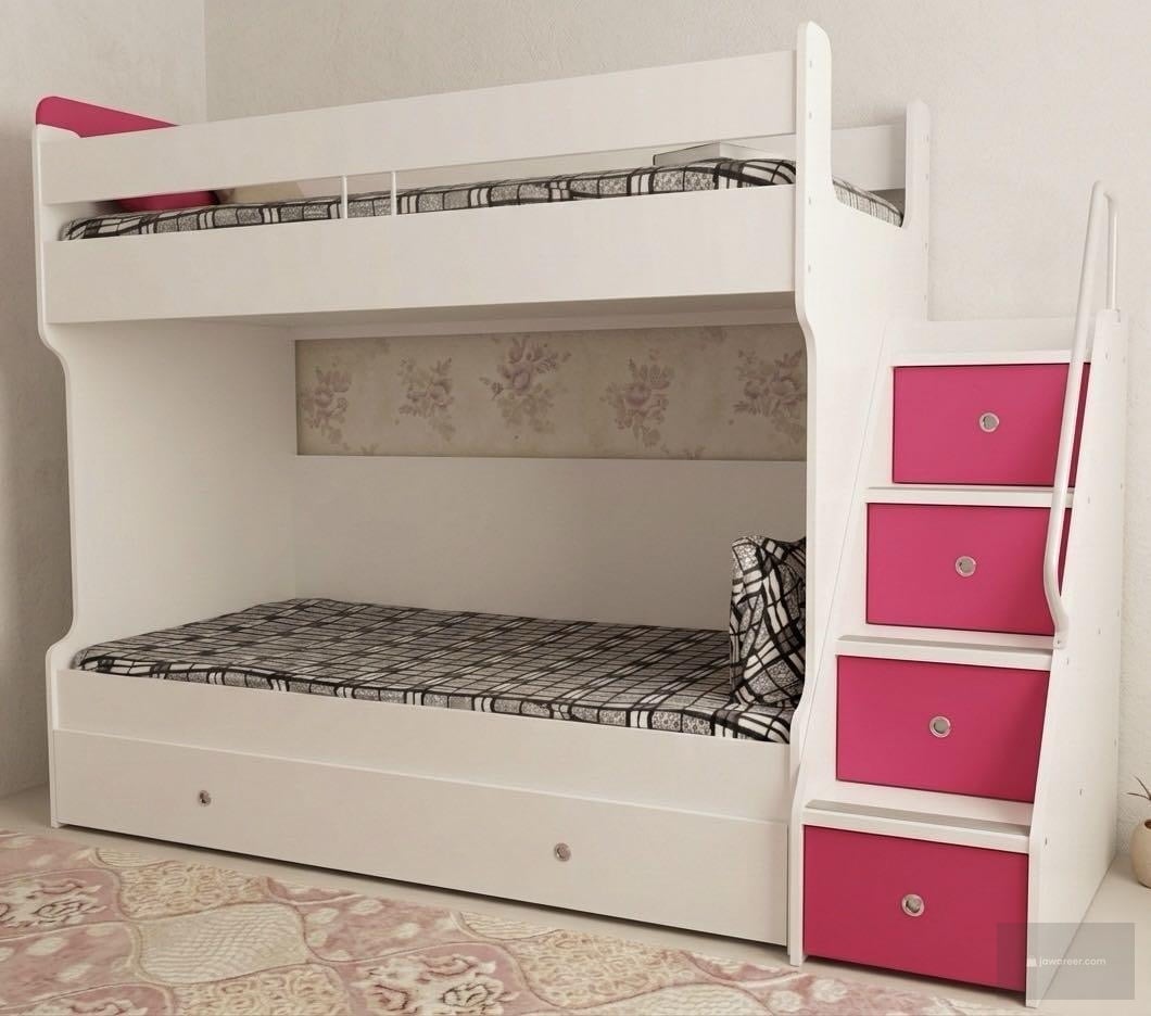 Used Turkish-style bunk bed in very good condition, made of high-quality treated wood. Includes one brand new orthopedic mattress for maximum comfort.  The bed features built-in stairs for easy and safe access to the top bunk, along with spacious storage 
