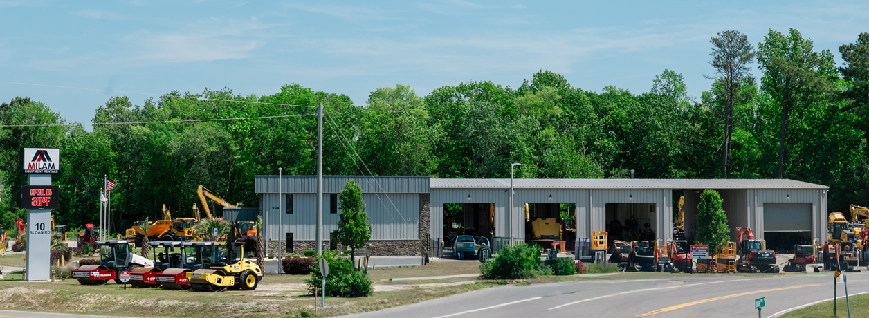 Milam Equipment Rentals yard with heavy equipment fleet