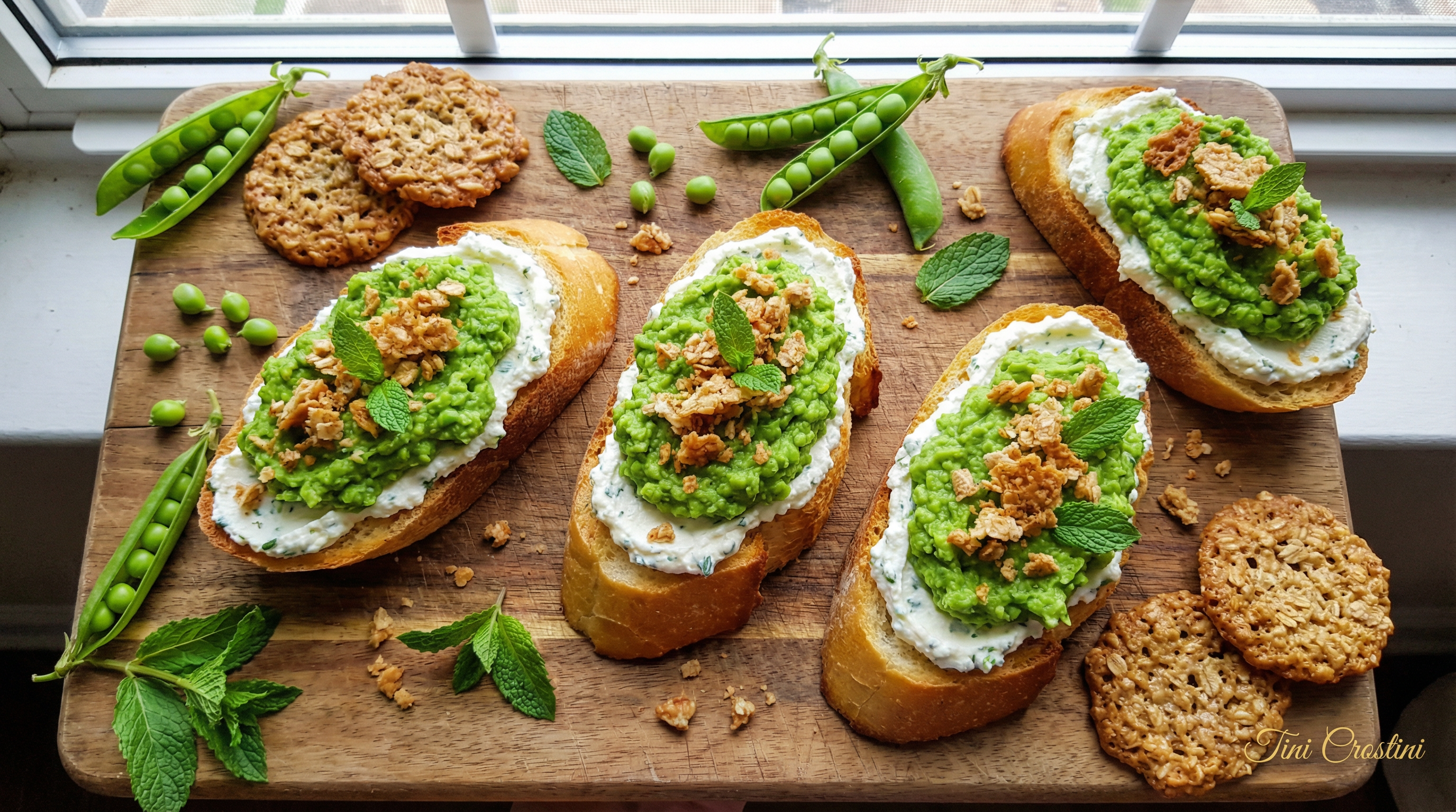 Lacy Oatmeal Pea and Ricotta Crostini