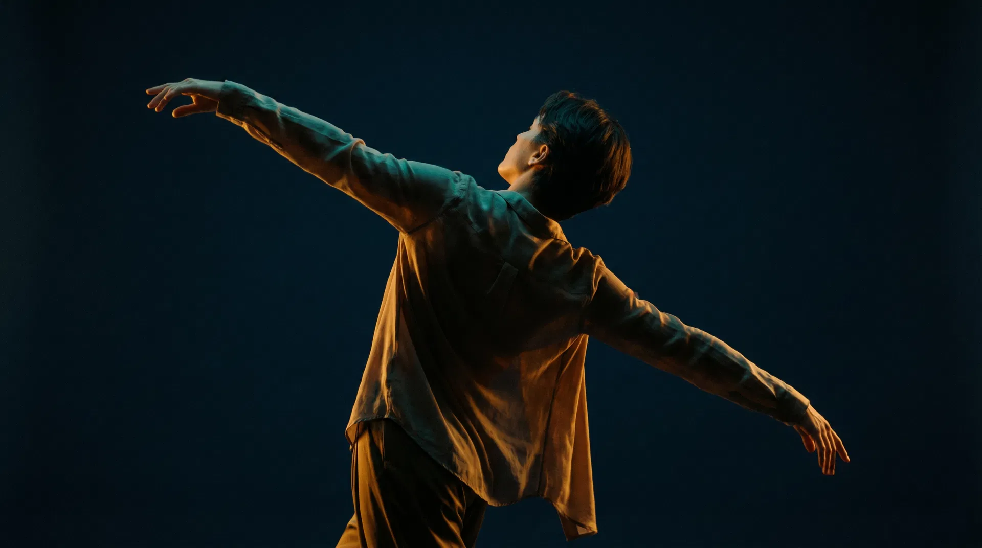 A person in free, expansive movement — representing freedom from chronic pain