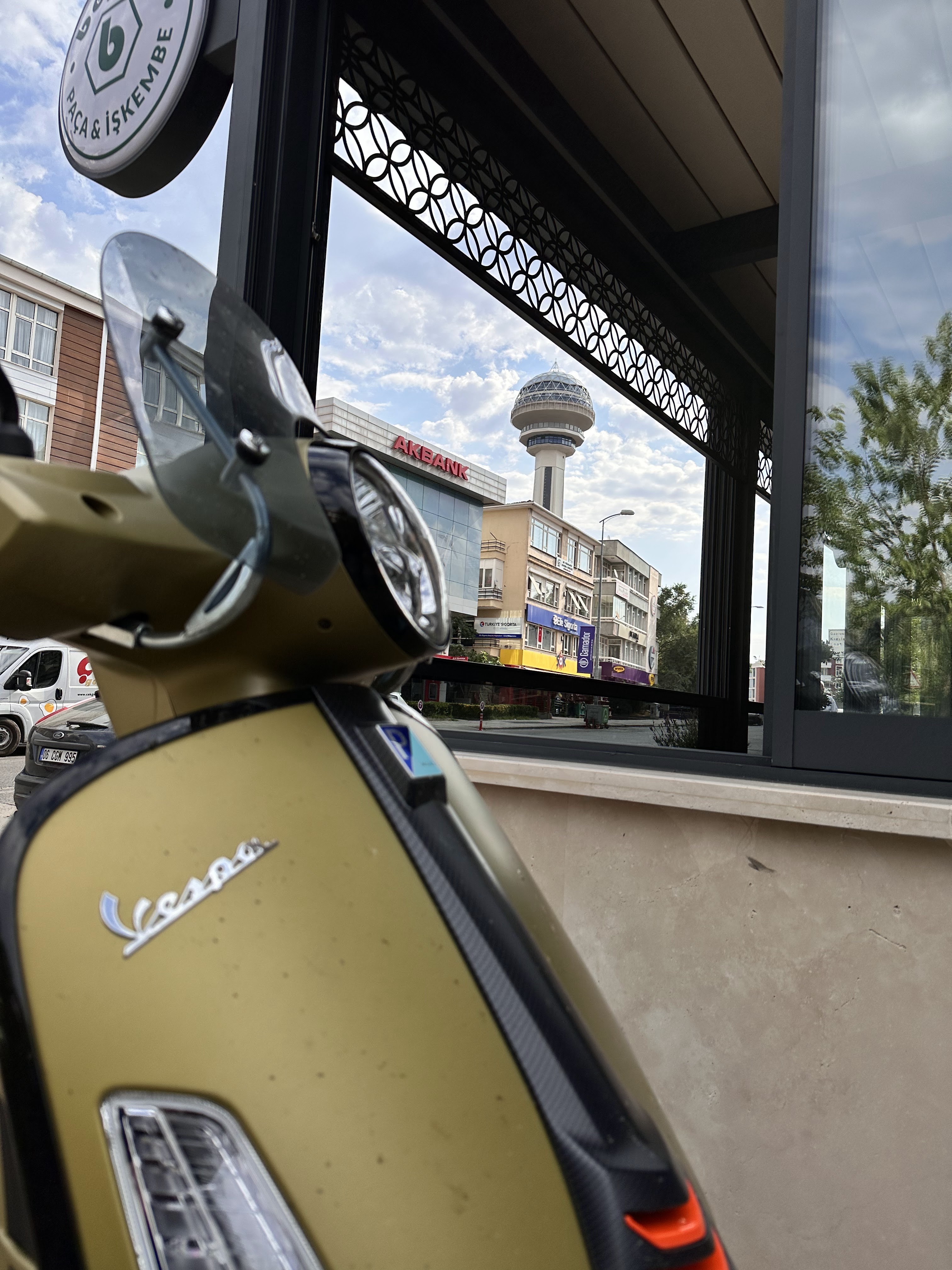 After three unforgettable days on the road, my journey reached the 1,500 km mark right here in Türkiye’s capital, Ankara. It was around 11 AM, the city calm, the sky clear, and Atakule standing proudly in the background—one of the timeless symbols of this city. Riding my Vespa 310 through changing landscapes, small towns, open roads, and endless horizons has been a reminder of how travel isn’t just about the destination, but the moments collected along the way.
This stop in Ankara felt special—a blend of history, modernity, and that familiar sense of being in the heart of the country. With nearly 1,800 km completed in total, this photo marks not only a milestone on the odometer, but a moment of gratitude for the freedom, clarity, and peace that the road always brings.