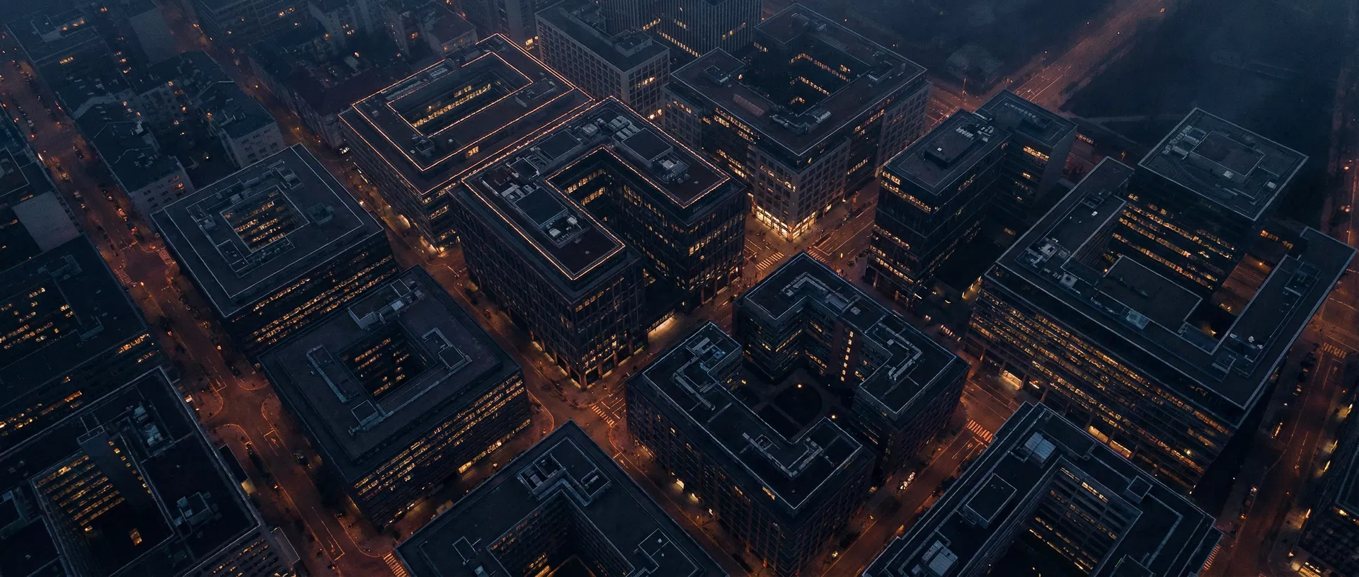 Aerial view of commercial real estate buildings representing the CRE Method strategy