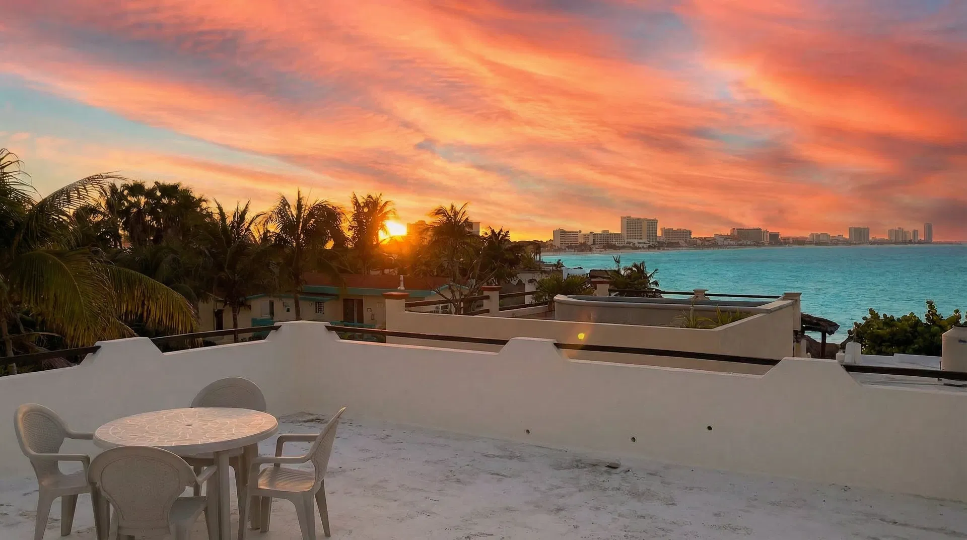 Sunset over Cancún Bay from rooftop