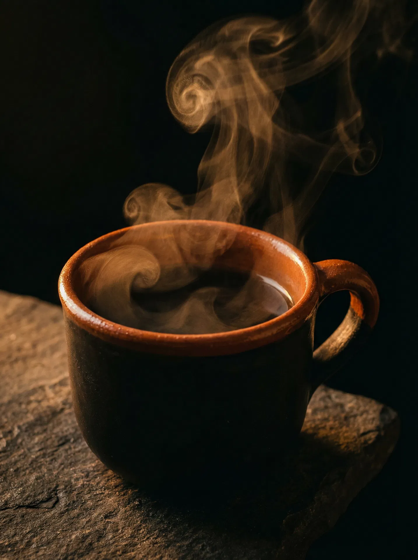 Steaming adobe clay coffee cup
