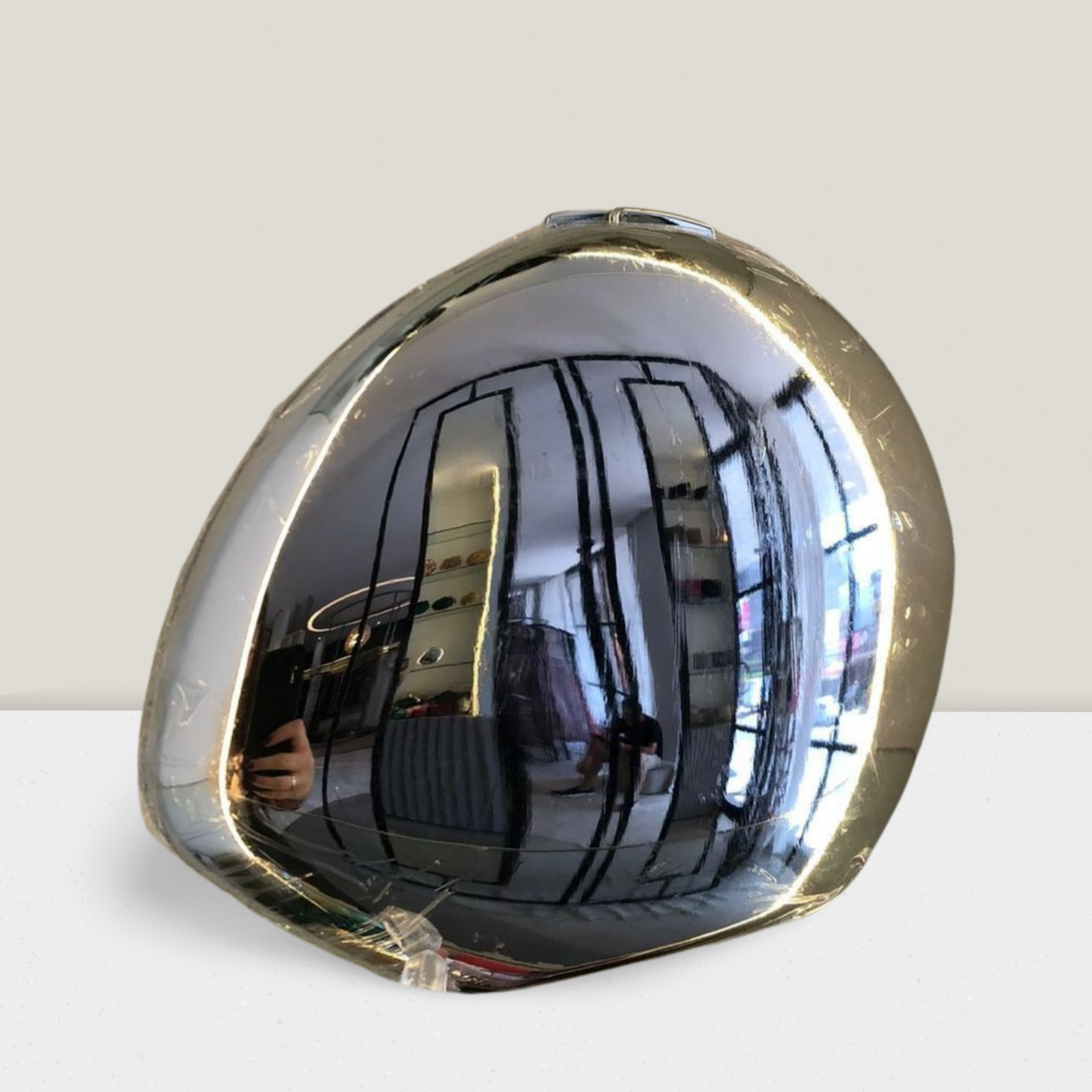 Clutch redonda espelhada prata