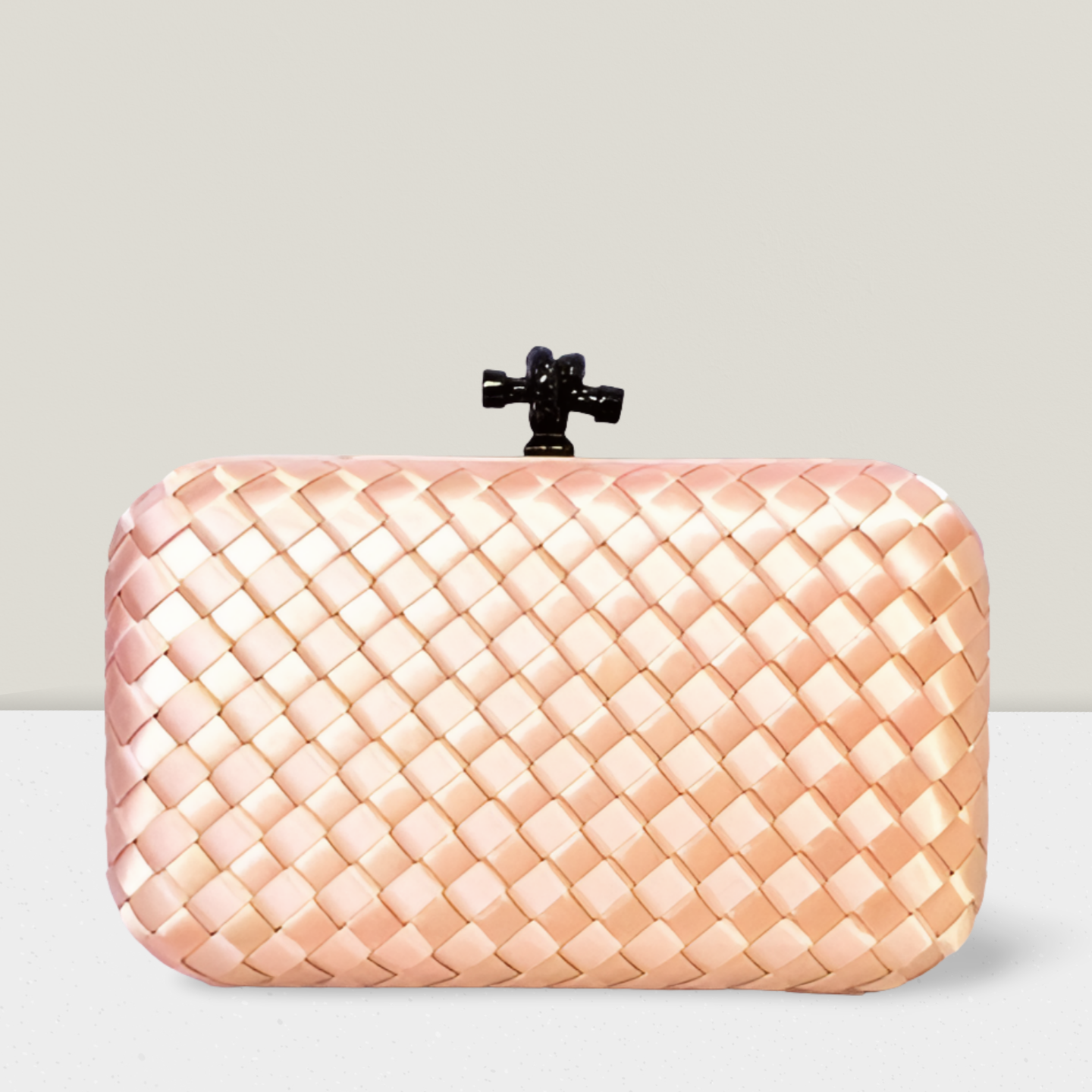 Clutch rosê trançada