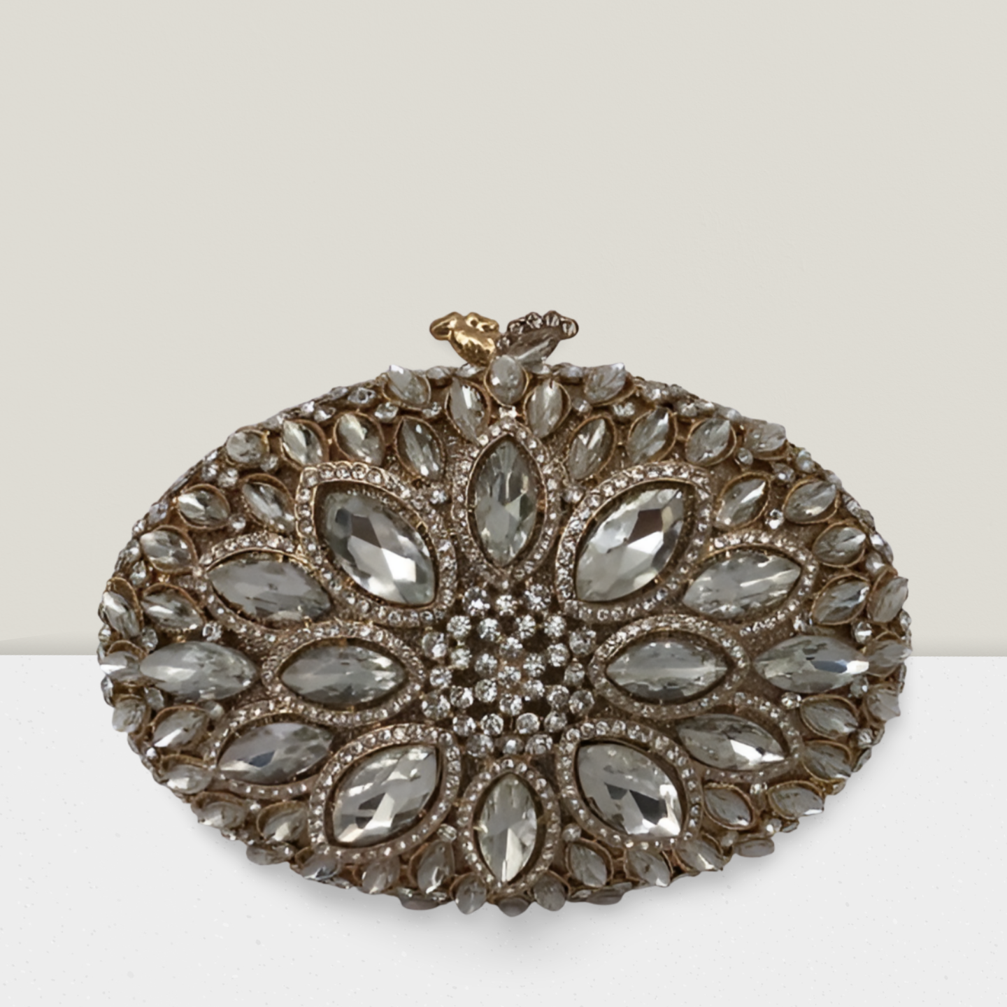 Clutch importada dourada pedra clara