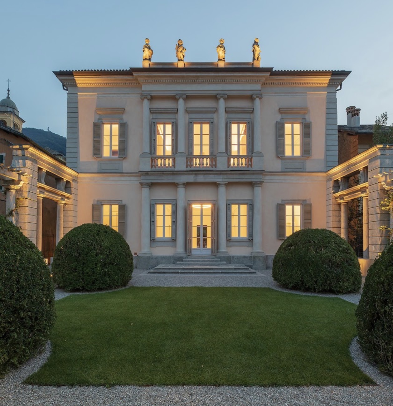 The historic facade of Villa Carminati Resta overlooking Lake Como