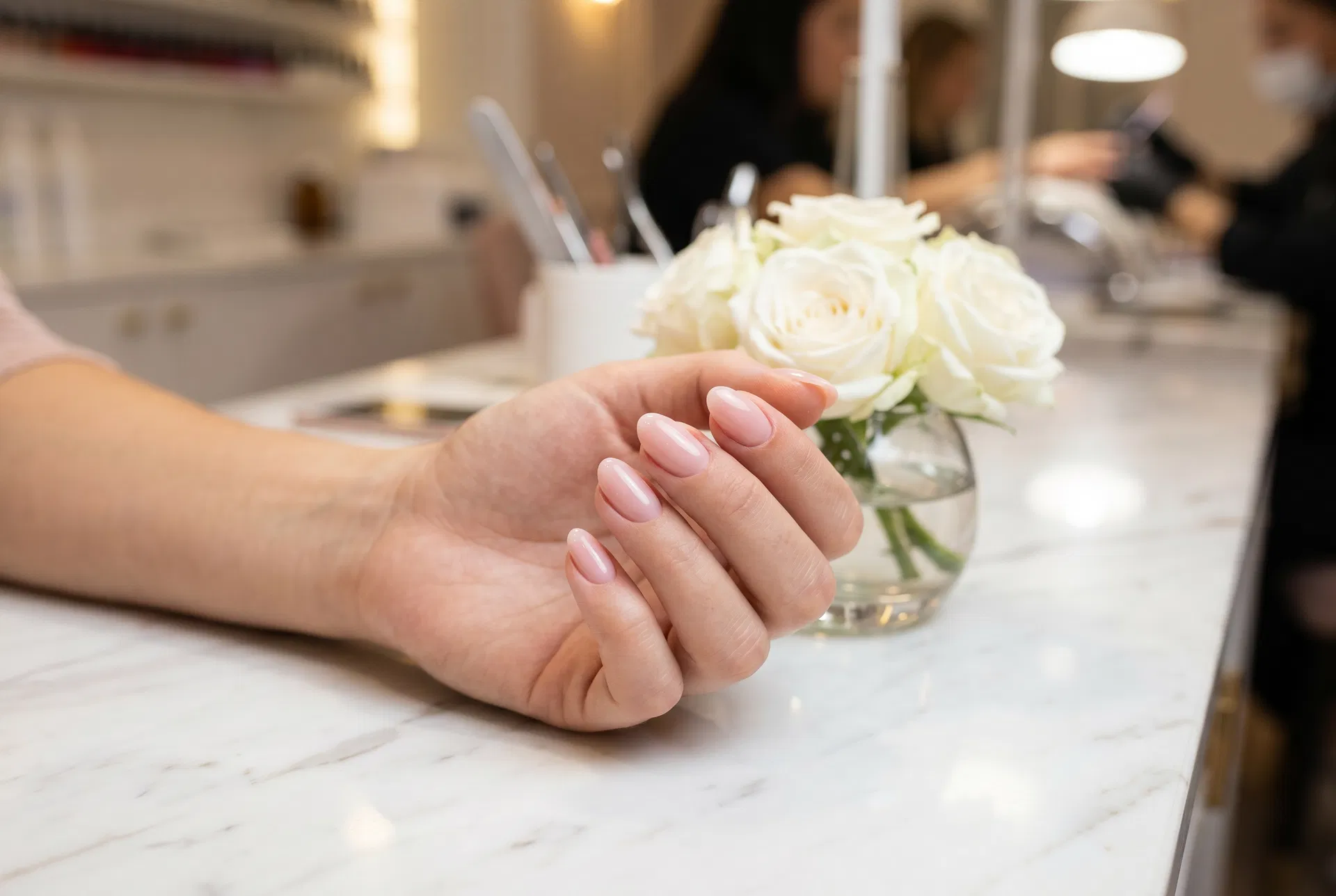 Finished Russian Manicure result — blush pink gel polish with immaculate cuticle work