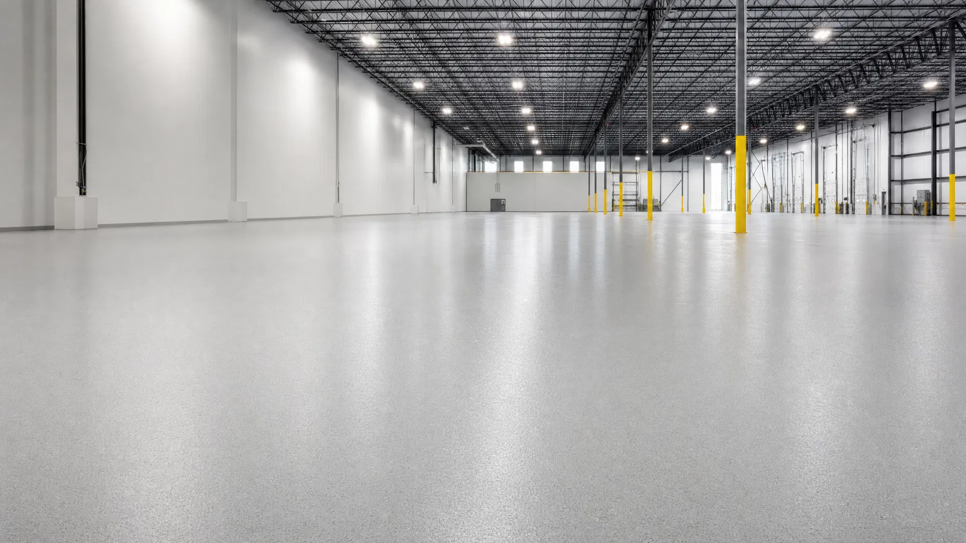Commercial warehouse with pristine grey epoxy floor coating in Baltimore, MD