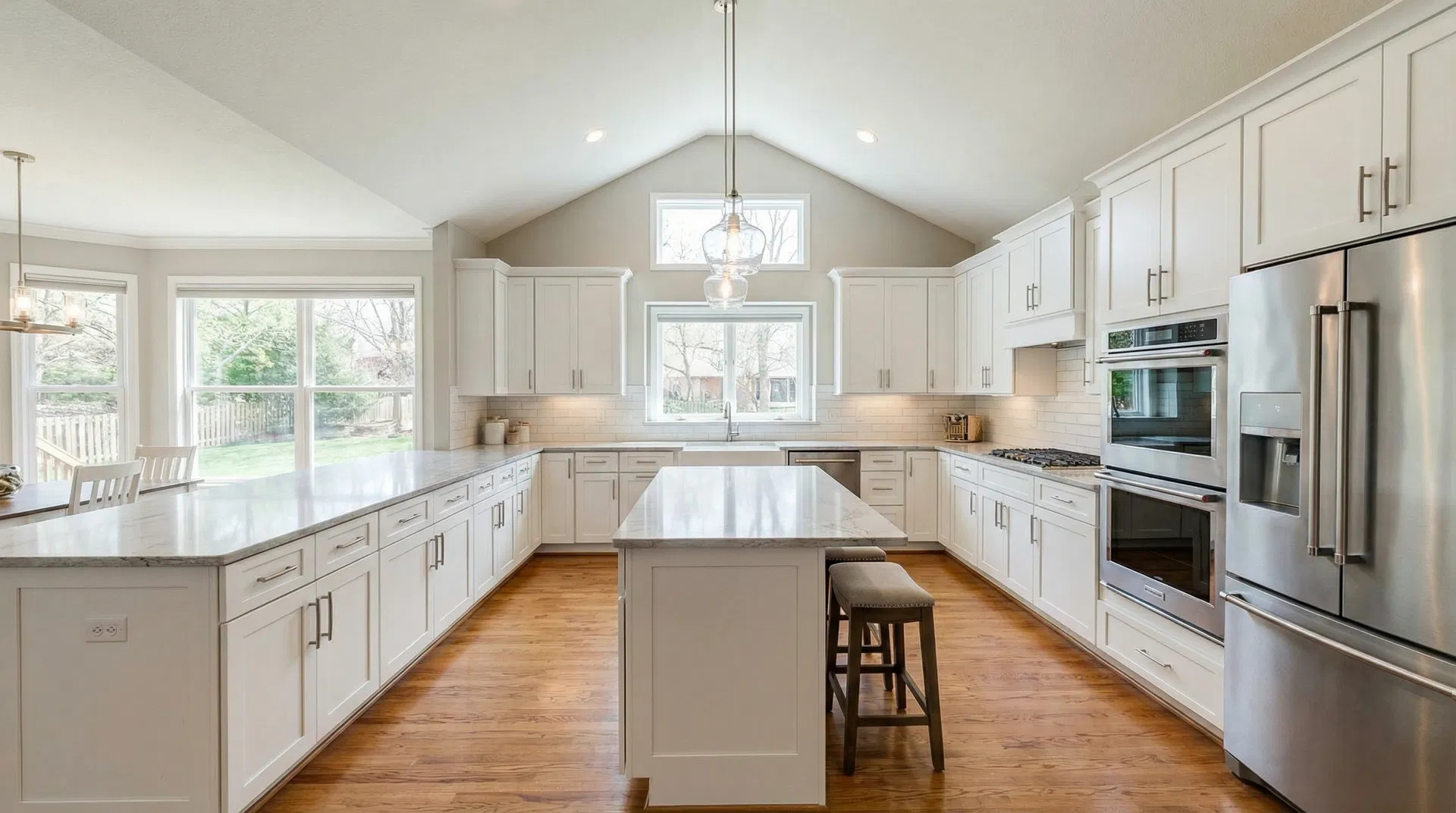 Beautiful kitchen remodel in Shawnee KS with white shaker cabinets and quartz countertops