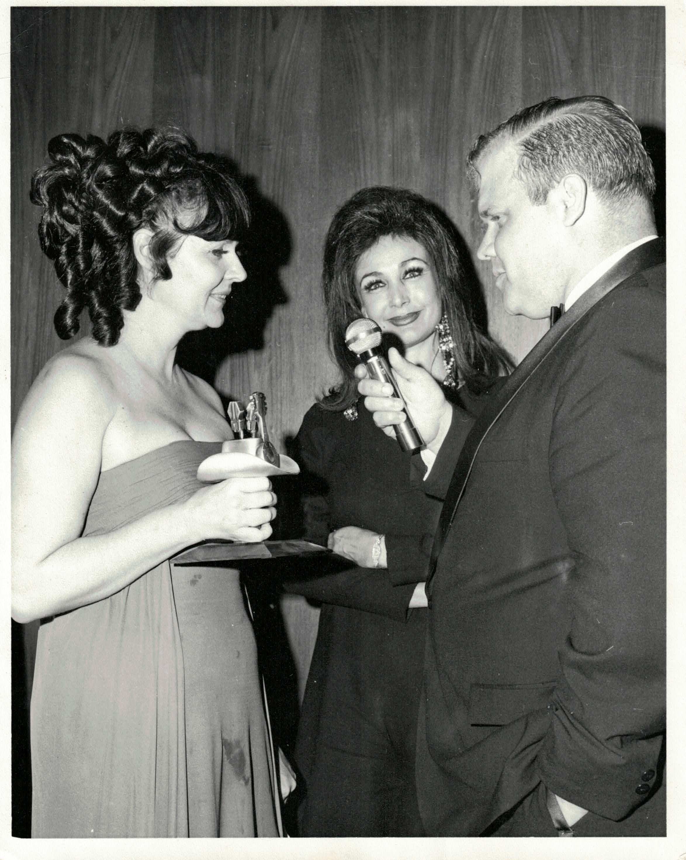 Audrey accepting award