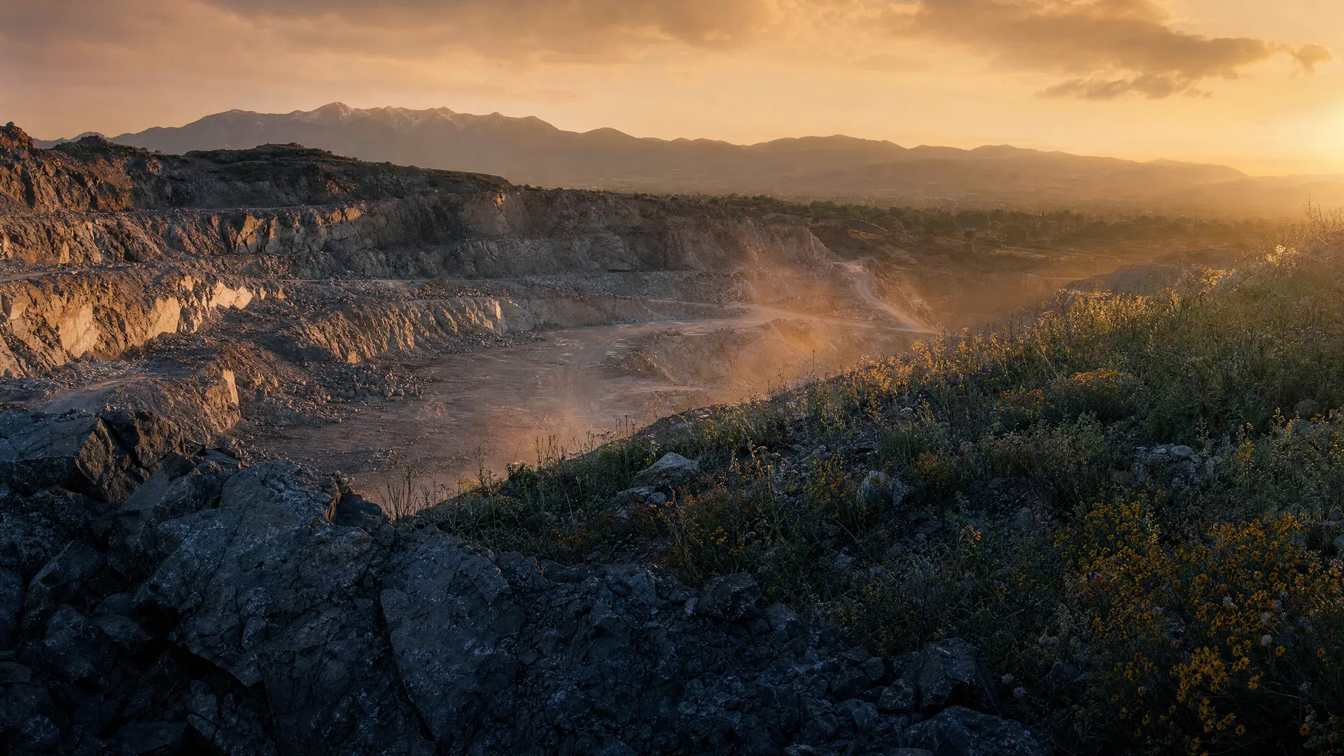 Utah limestone rock quarry in ecological transformation with wildflowers reclaiming the land