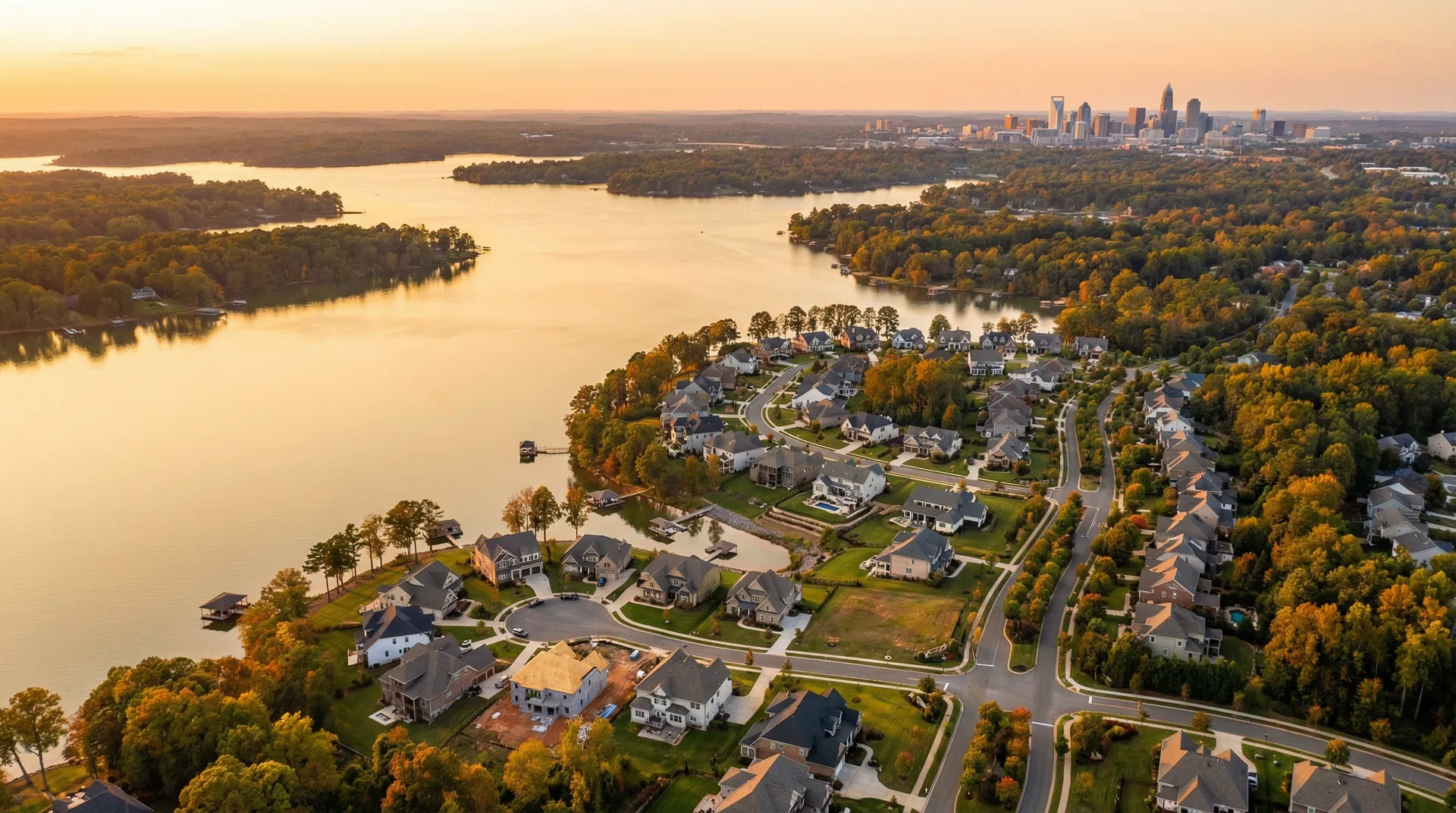Aerial view of Lake Wylie and southwest Charlotte showing The Palisades community, Lake Wylie, and the Charlotte skyline on the horizon