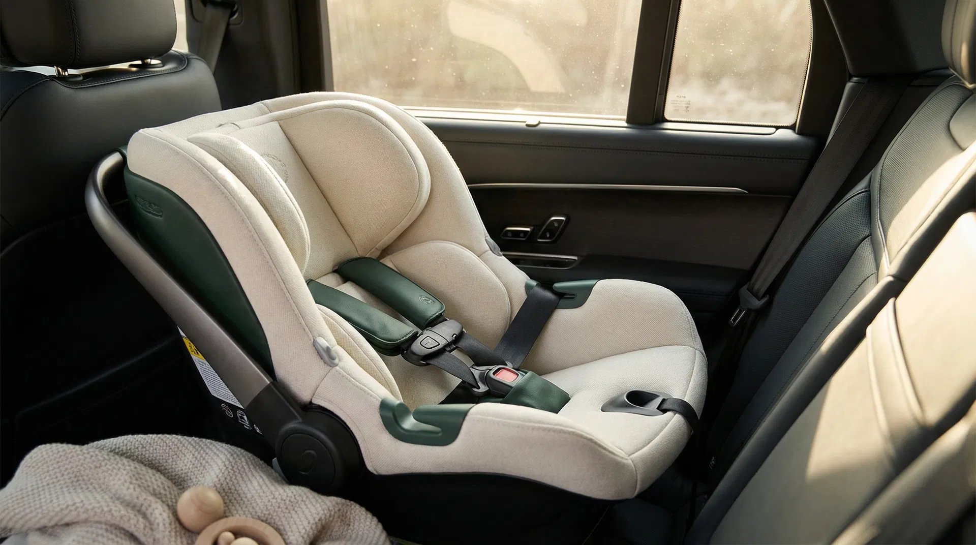 Baby car seat safely installed in vehicle