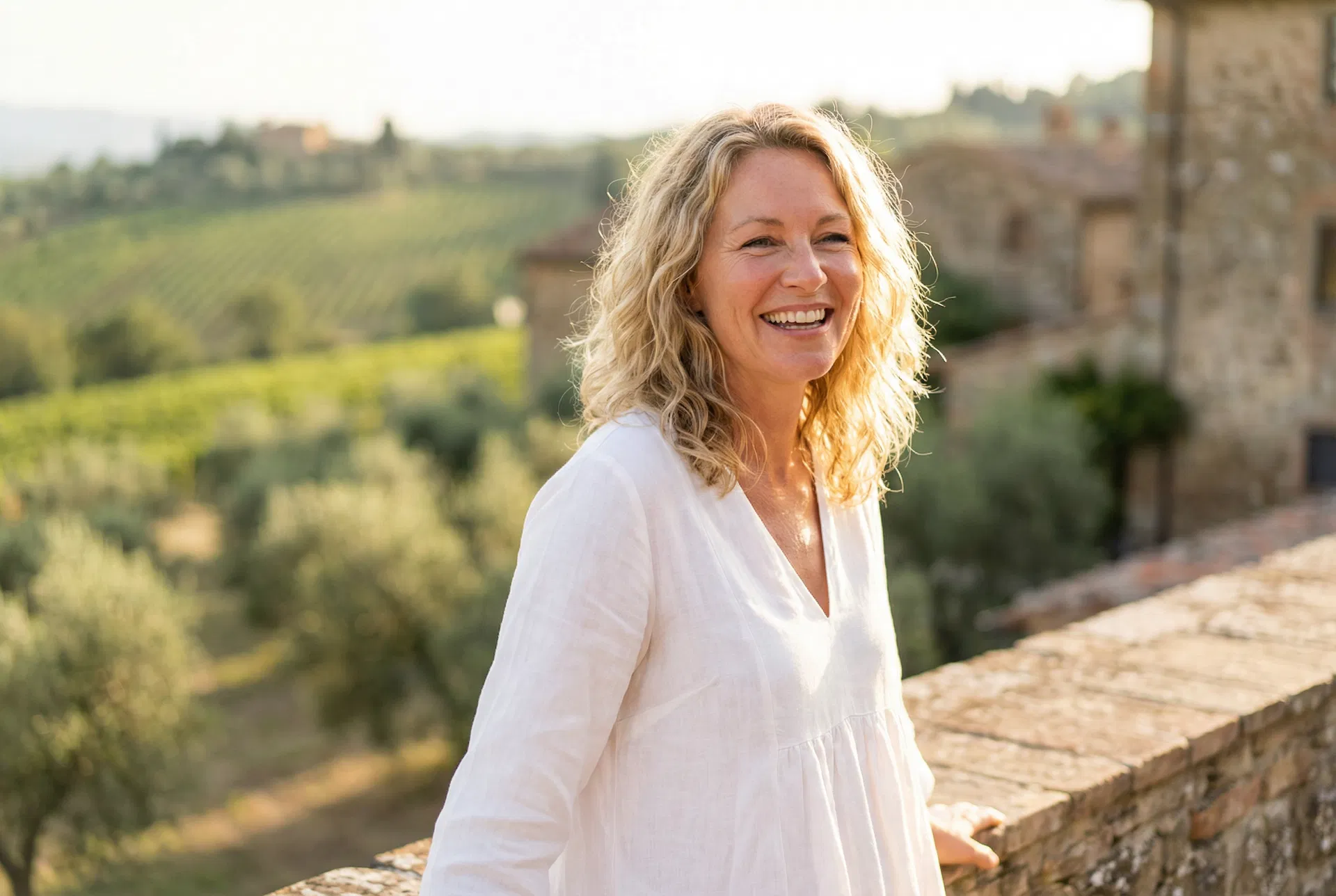 A woman in a sunlit room
