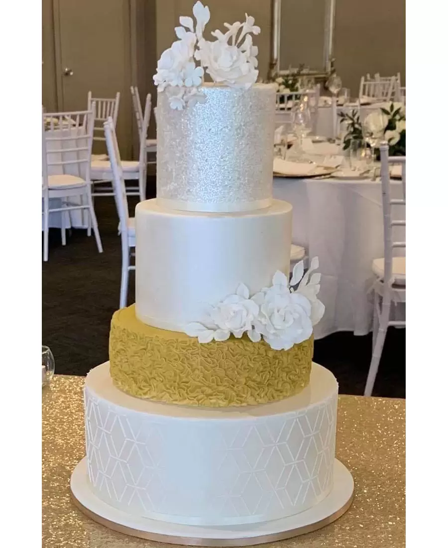 Four tier wedding cake with textured detail 
