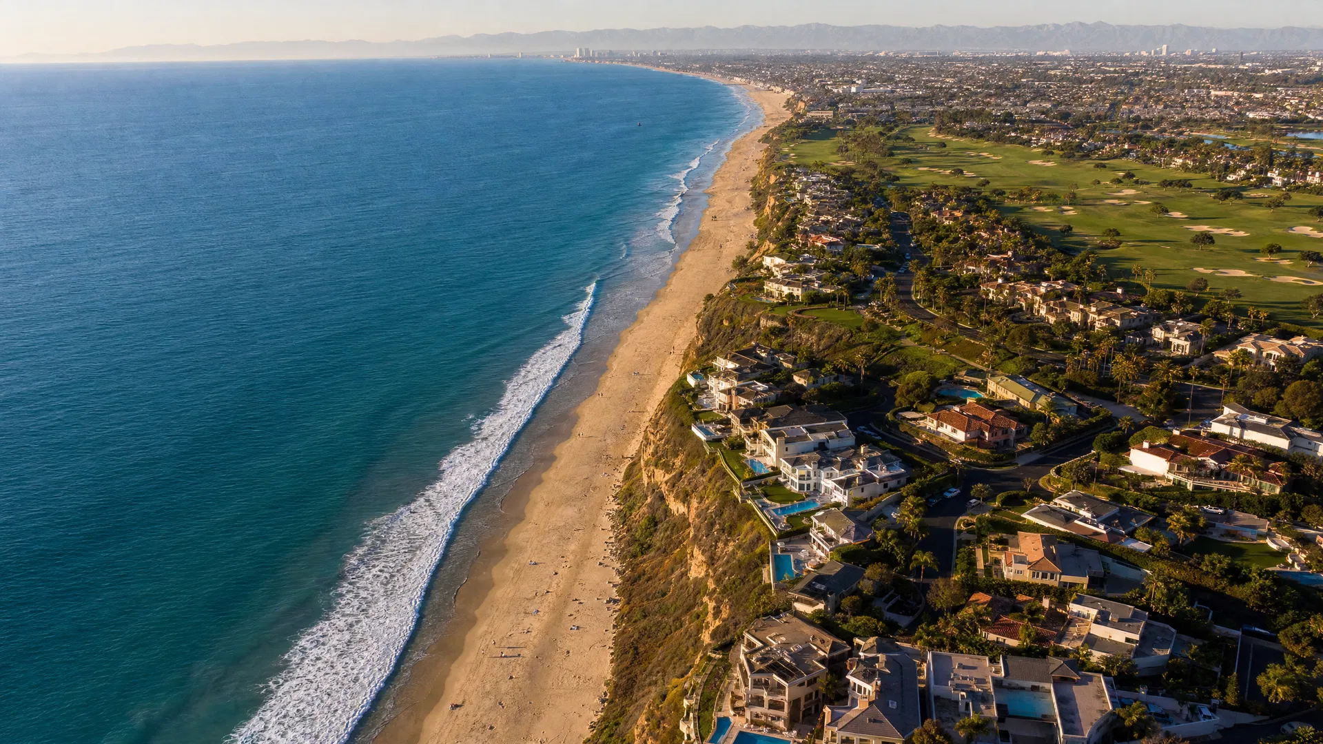 Aerial view of Huntington Beach coastline and Seacliff community