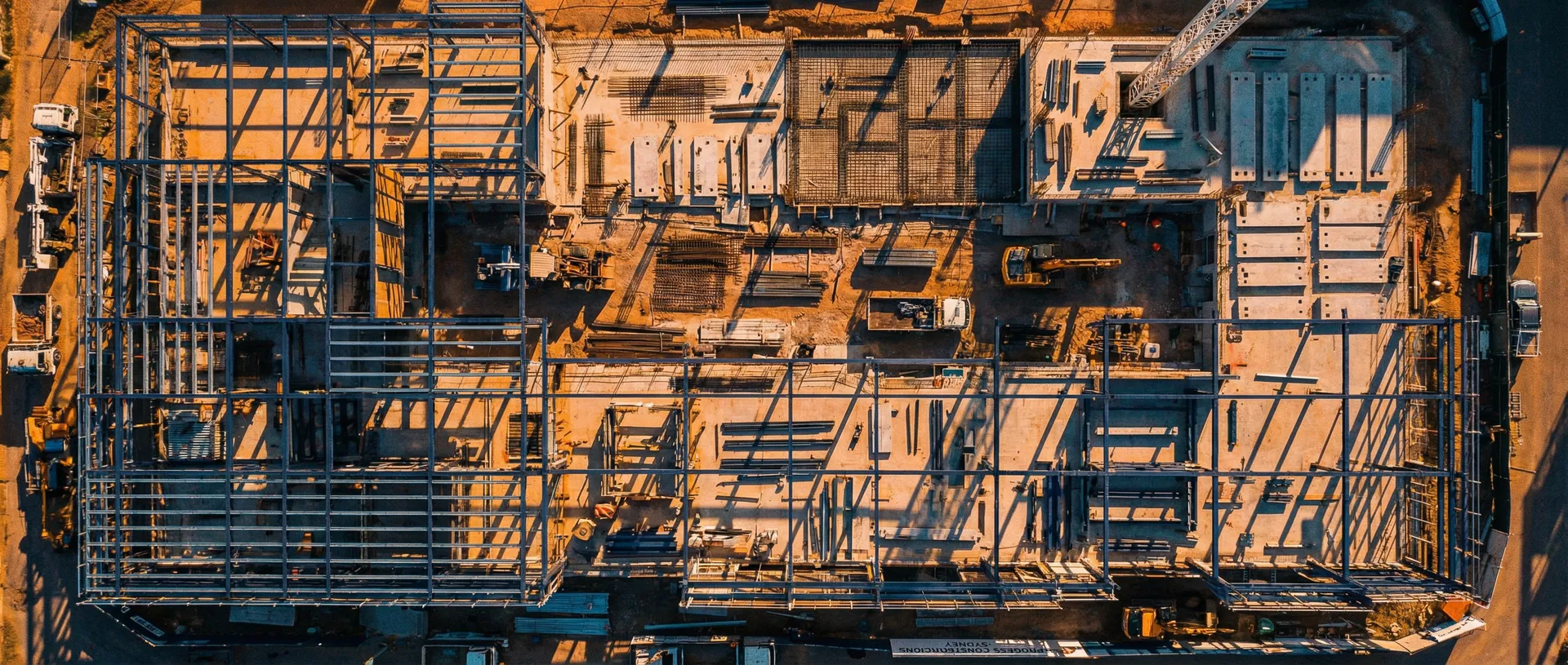 Trade apprentices working together on a building site