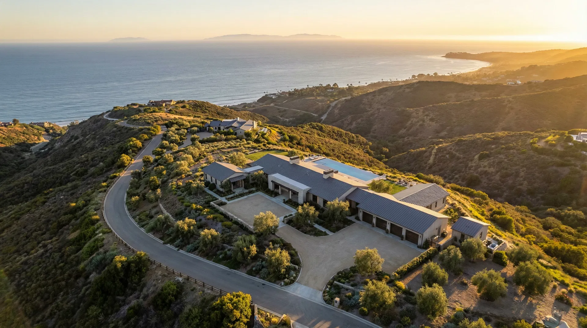 Aerial view of Malibu luxury estate at golden hour
