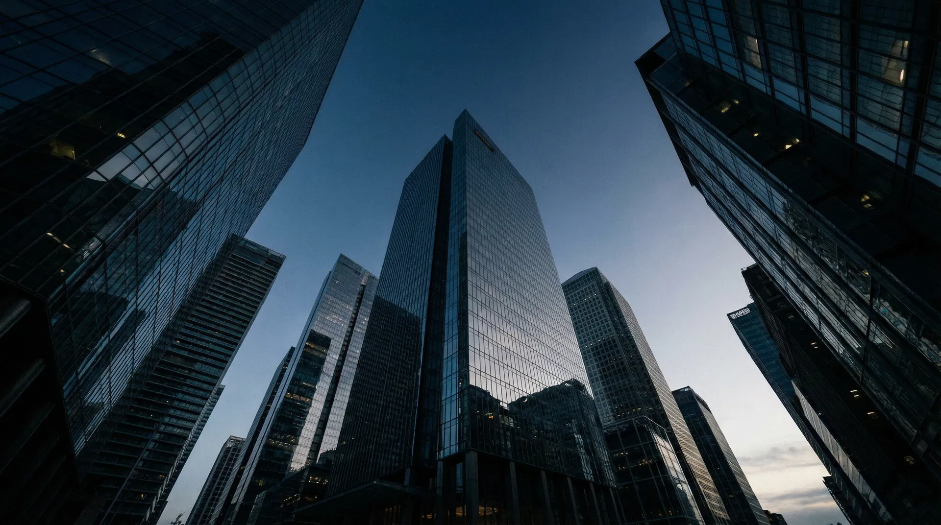 Modern financial district skyline — Fund Manager Academy hero background