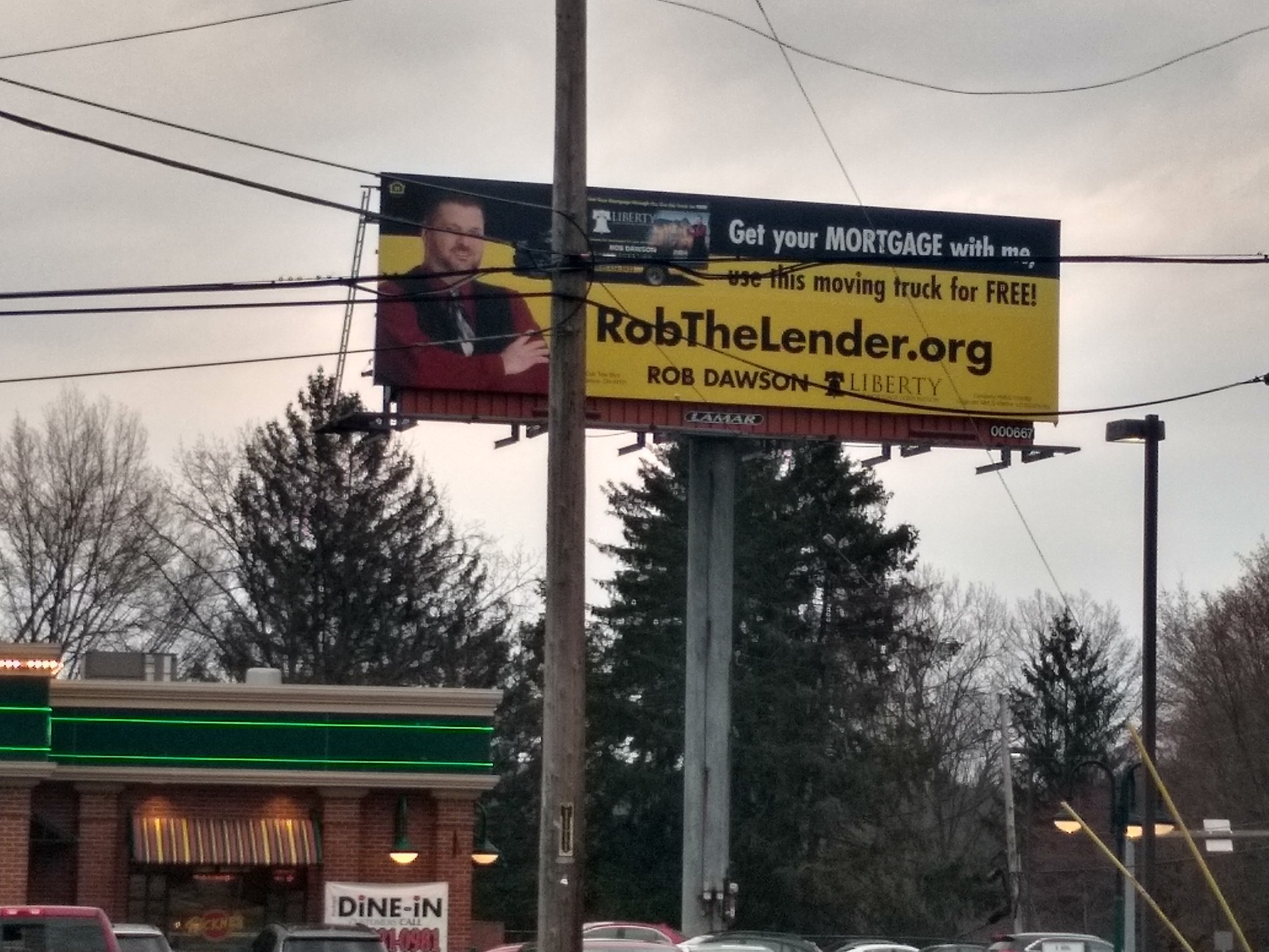 Old billboard near where I used to live. Just a little constructive criticism here Robert, but next time you buy a domai