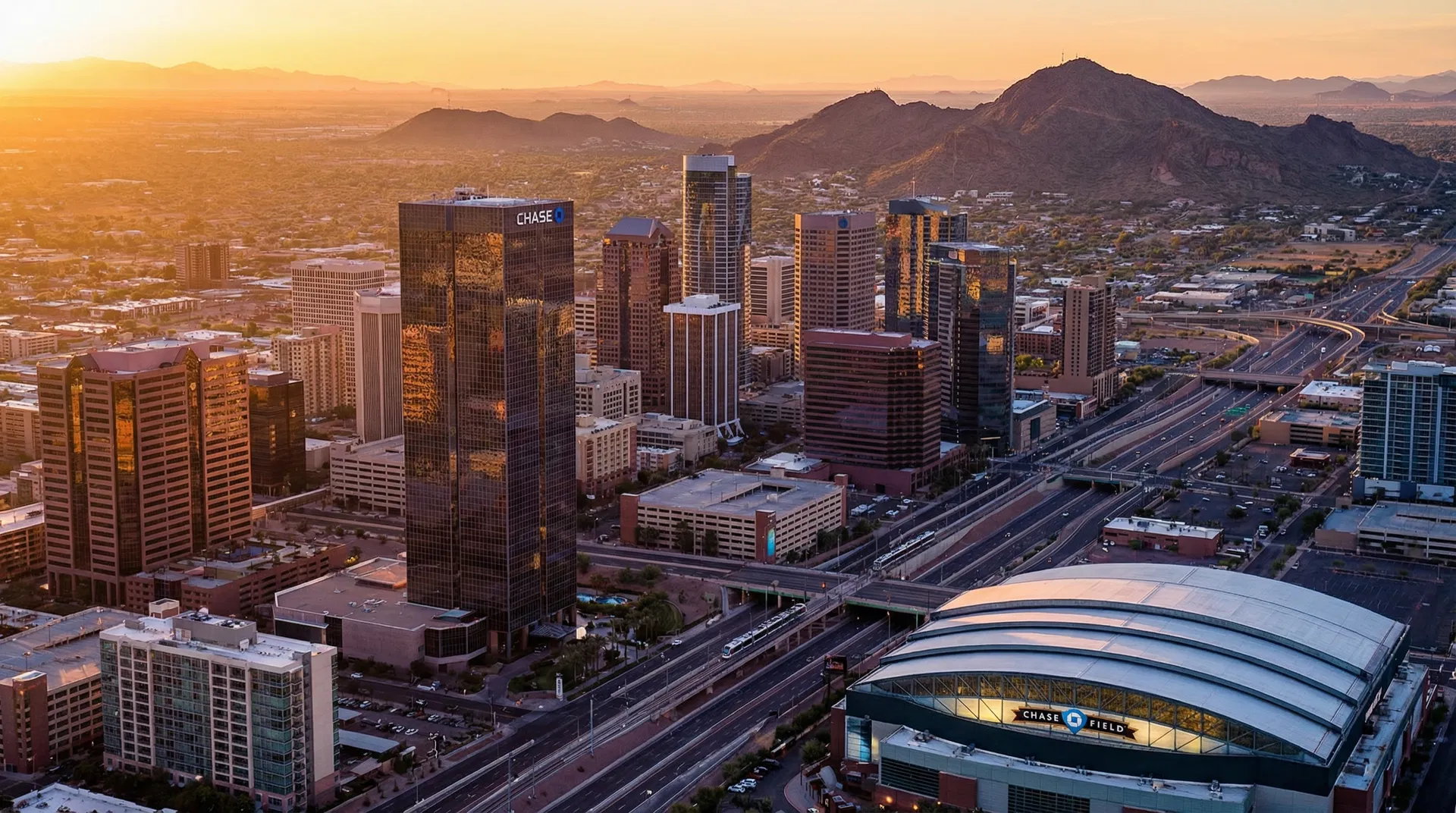 Phoenix Arizona skyline at golden hour with Camelback Mountain