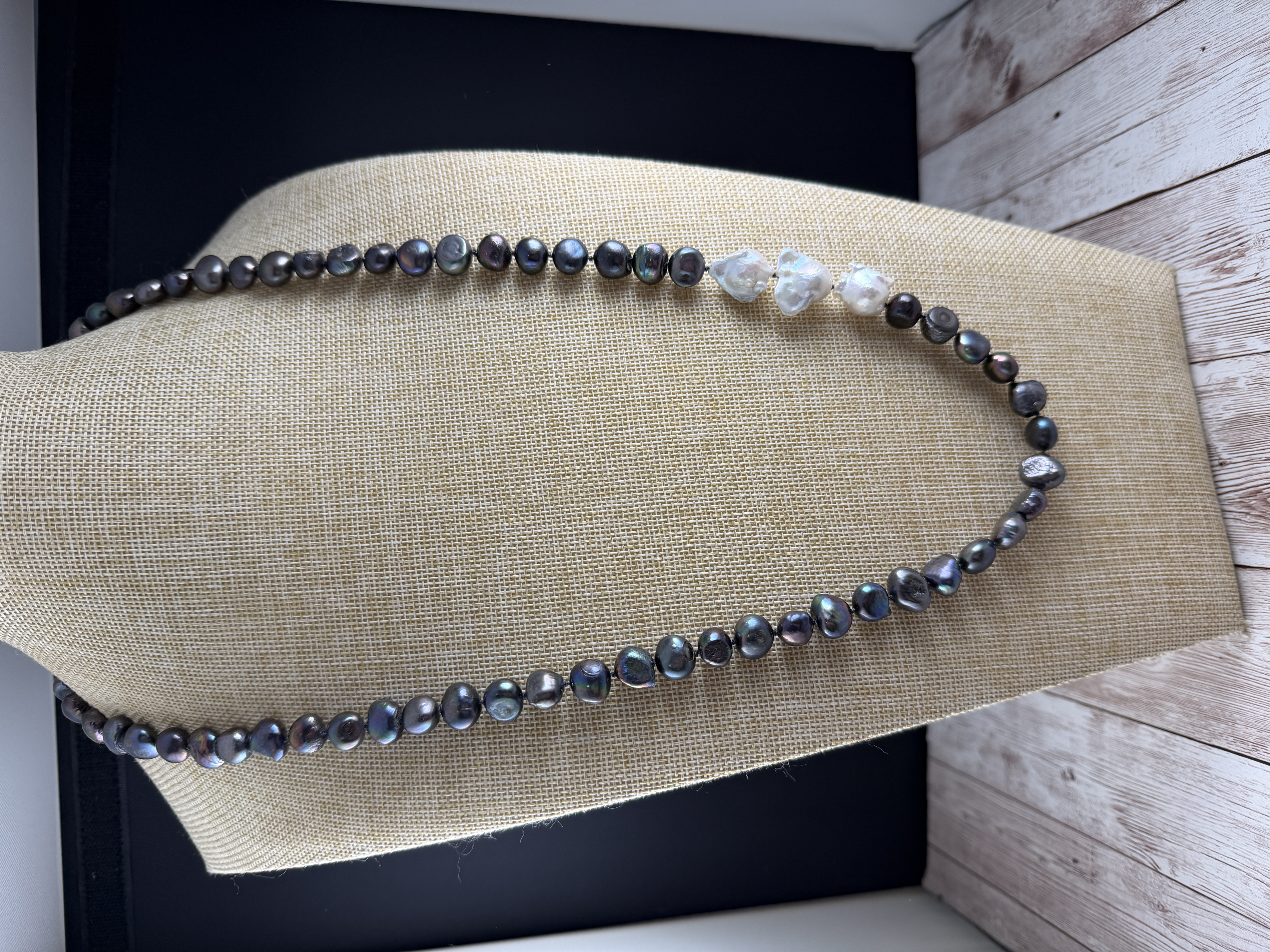 Hand Knotted Peacock Pearl Necklace With Baroque Pearl Accents.