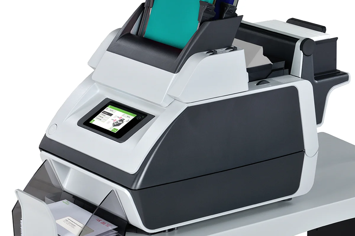 Quadient DS-40i compact folder inserter processing 1,400 envelopes per hour for small offices and low-volume mailing operations