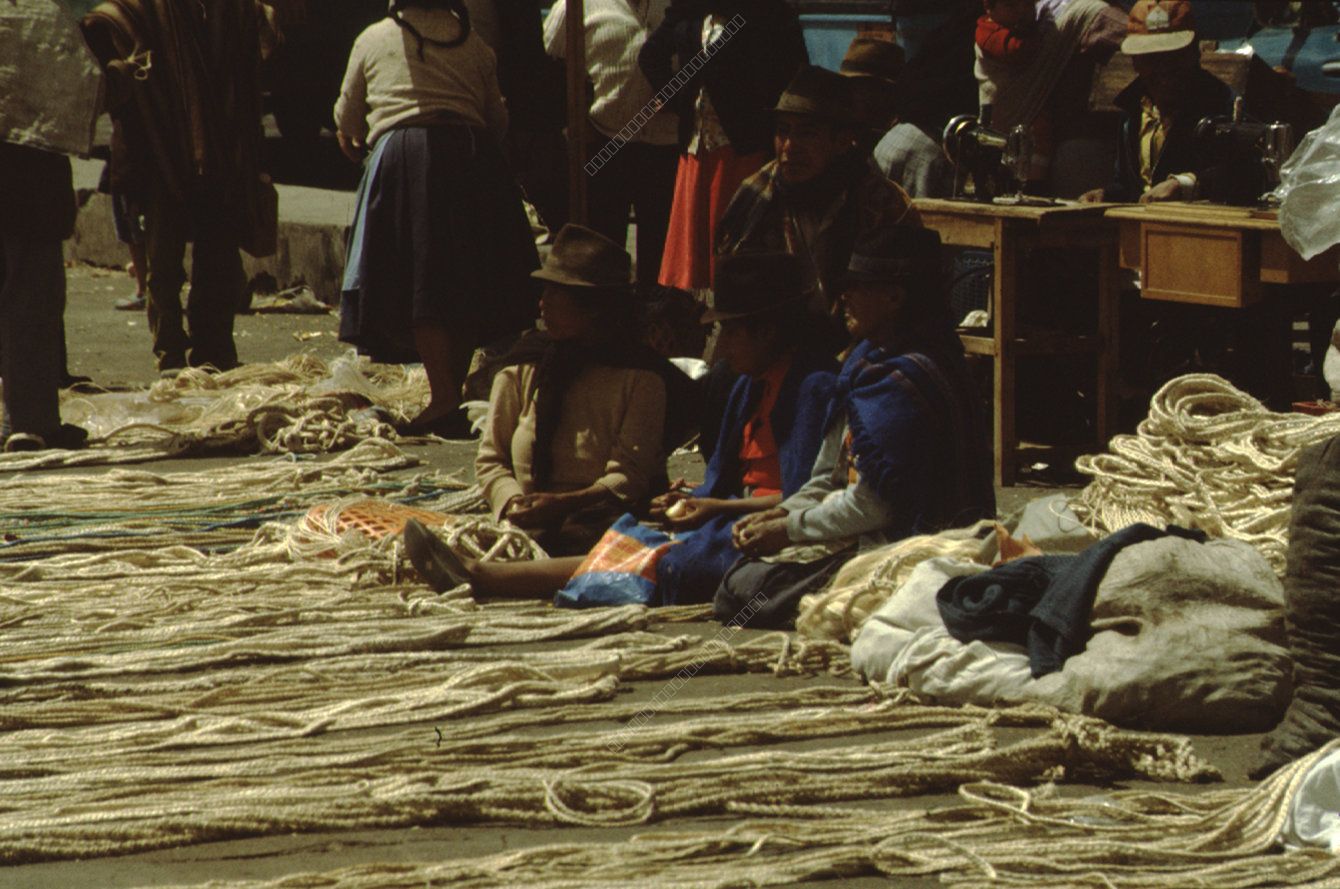 Market Scene in the Andes: Rope Vendors and Traditional Clothing