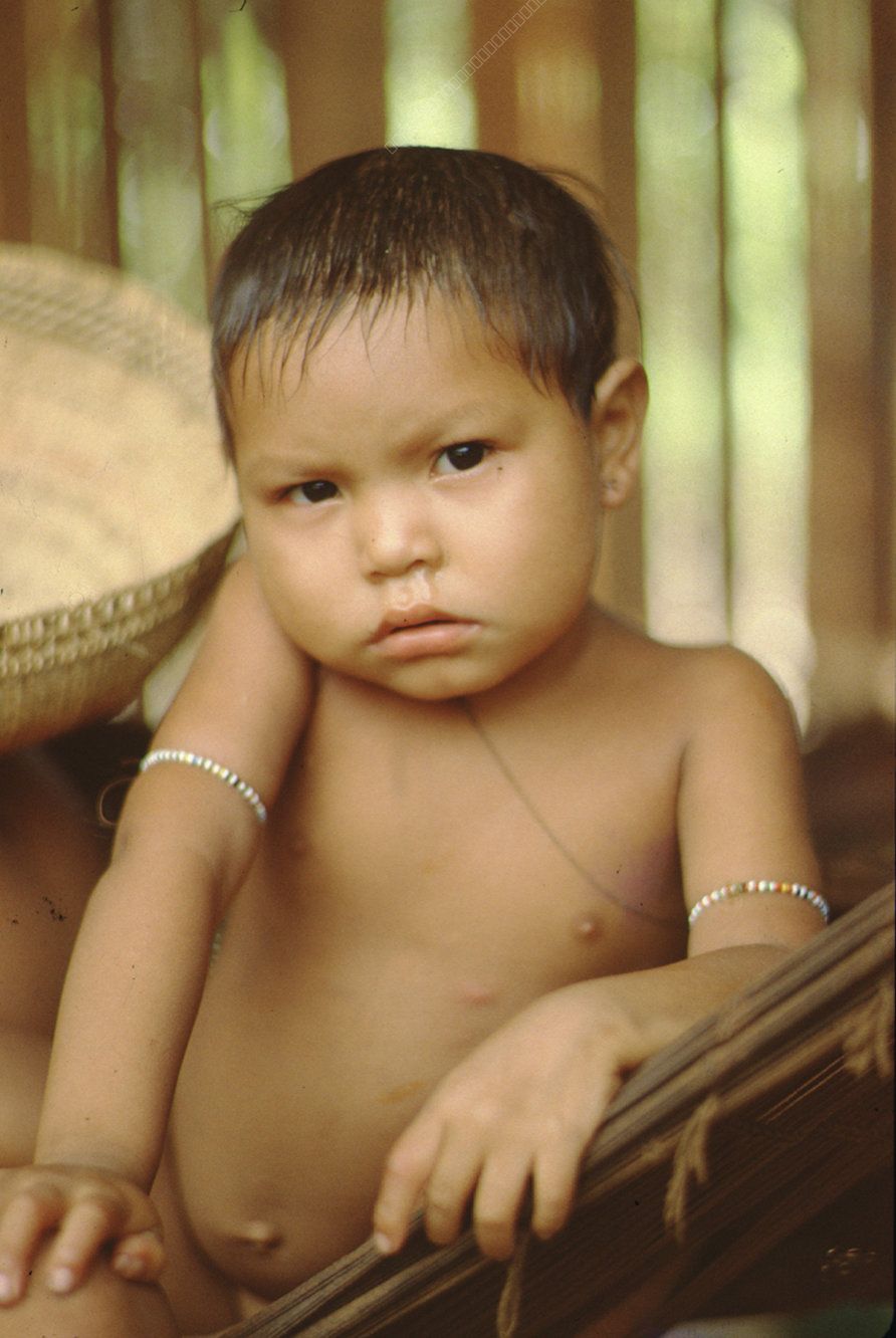 Portrait of an Indigenous Toddler with Beaded Bracelets