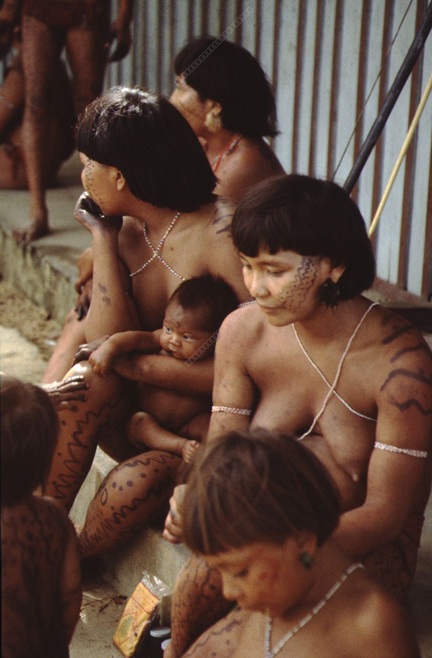 Indigenous Women with Baby and Traditional Body Painting