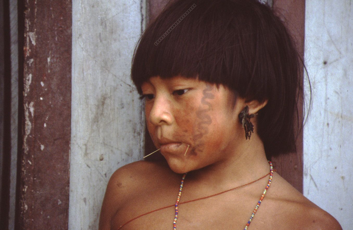 Portrait of an Indigenous Child with Traditional Facial Markings
