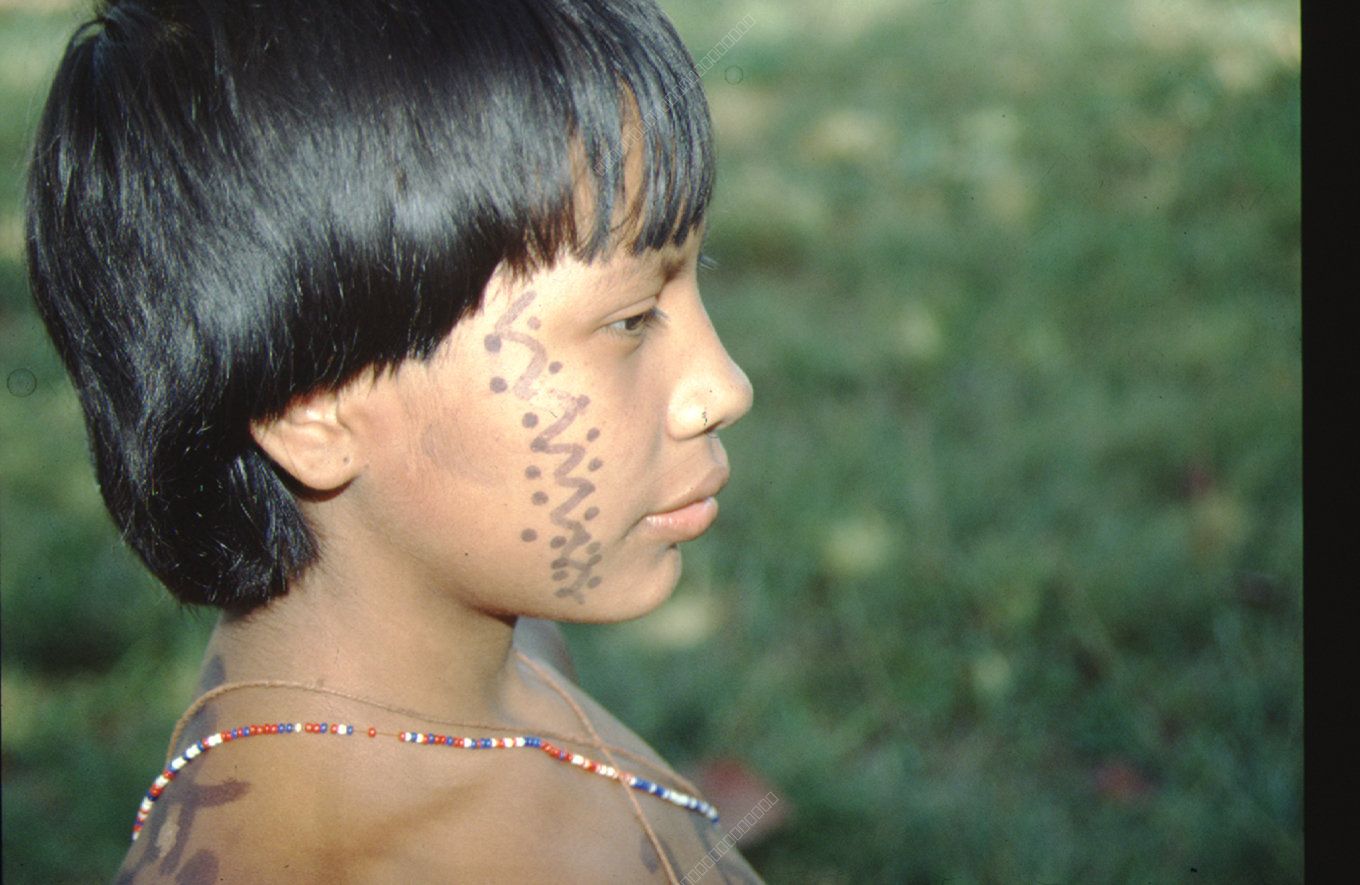 Portrait of an Indigenous Child with Traditional Face Painting