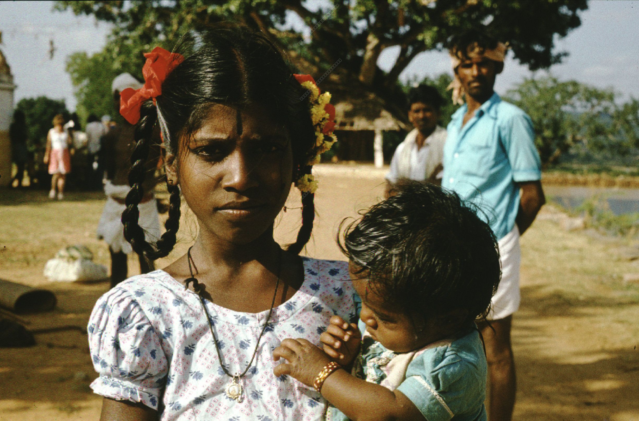 Portrait of a Young Woman with Child in South Asia