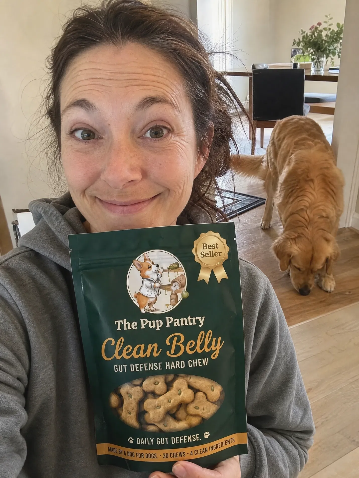 Dog owner holding Clean Belly